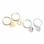 Two pairs of hoop earrings with heart charms on a white background