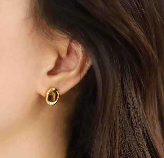 Sorelle studs showin tigers eye and gold