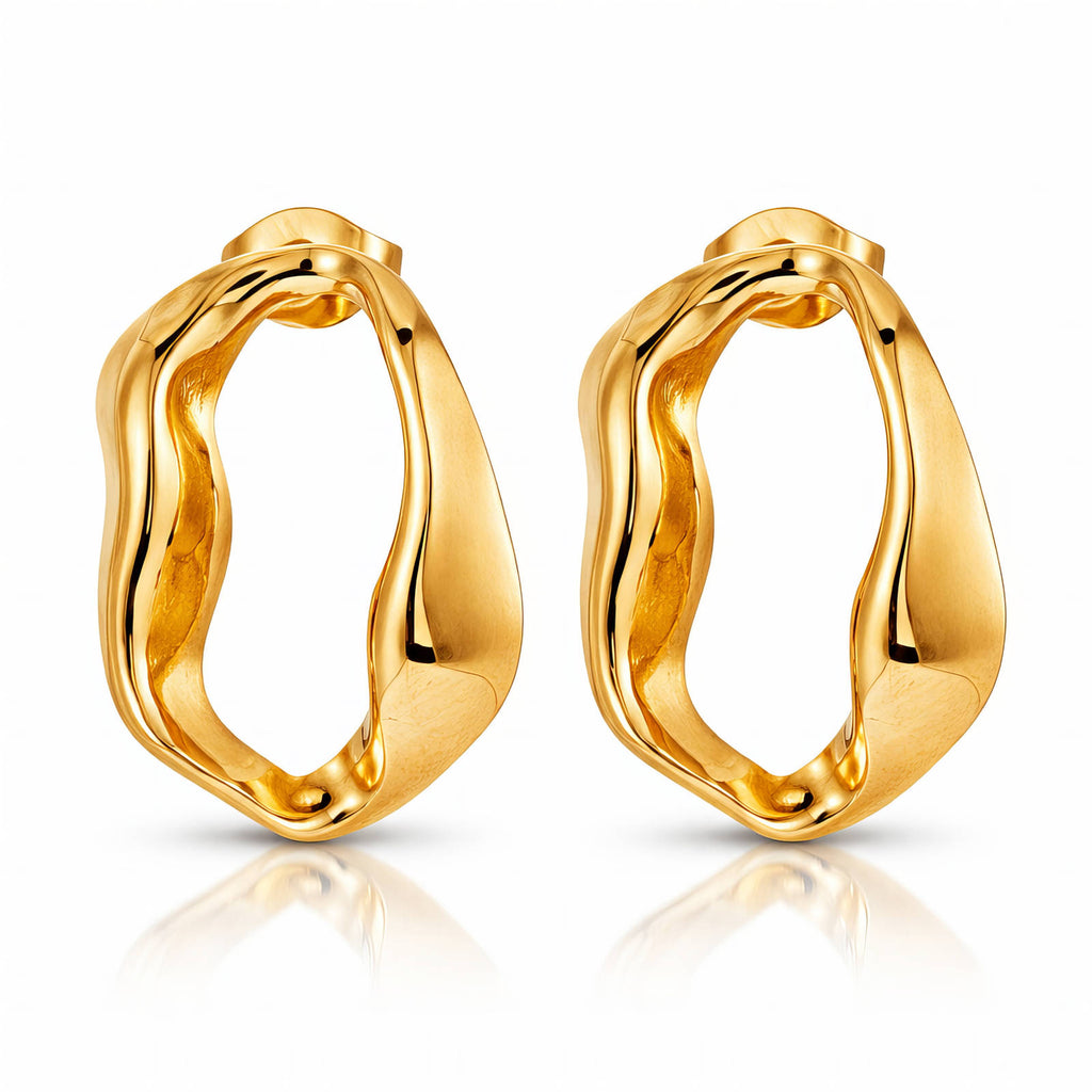 Pair of gold hoop earrings on a white background